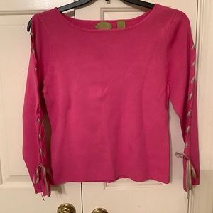So cute pink sweater with darling ribbon detail.  Size L